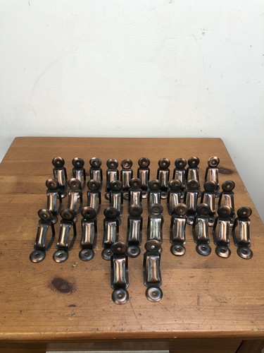 Art deco stair rod clips - art,